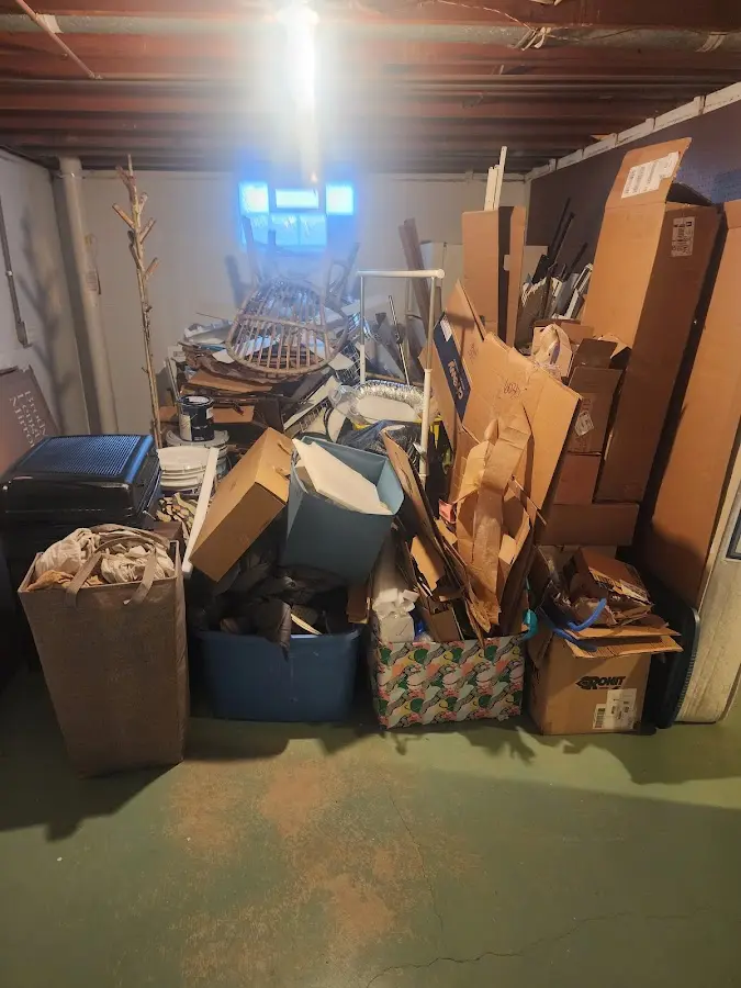 Roll-off dumpster container at job site for 4 Yard Dumpster Rental in Walton